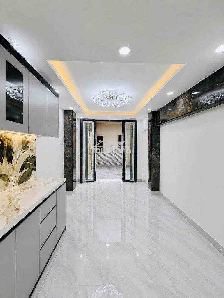 Bán nhà mới 3 tầng gần đường tôn đản - 4