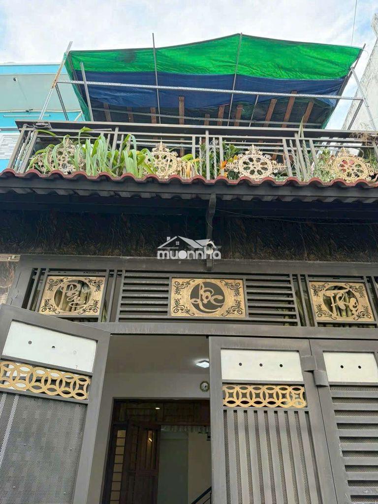 4x14 trệt lầu 2pn gần pmqtrung có máy giặt hẻm ô tô 