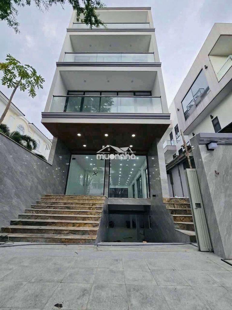 Cho thuê tòa nhà văn phòng có hầm và 4 lầu sàn trống mới xây xong 